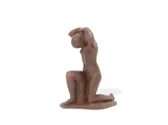 Louis Dejean, semi-glazed terracotta figure of a kneeling stylised nude maiden, terracotta