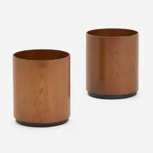 Jens Risom, Wastepaper baskets from a Los Angeles interior by Oliver Furth, set of two, c. 1960, molded walnut plywood, plastic