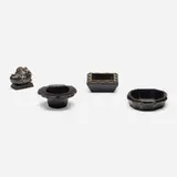 Collection of four table articles from a Los Angeles interior by Oliver Furth by Elizabeth Garouste and Mattia Bonetti, 1999, blackened and gilt bronze, sold Jul 2023