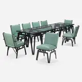 Walter Lamb, Outdoor dining suite, set of eleven, c. 1945, painted iron, vinyl upholstery, tempered glass