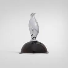 Penguin salt shaker by Art Déco, c. 1935, stainless steel, ebony, sold Aug 2026