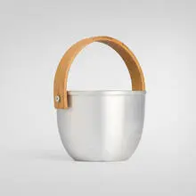 Russel Wright, Ice bucket, c. 1932, spun aluminum, birch