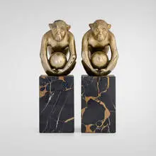Georges Henri Laurent, Seated Monkey bookends, pair, c. 1930, patinated bronze, marble