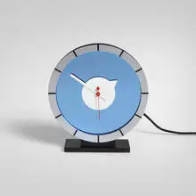 Gilbert Rohde, Table clock, c. 1933, mirrored glass, chrome-plated and enameled steel, aluminum