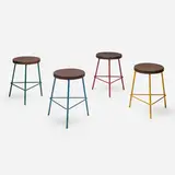 Stools from Chandigarh, set of four by Pierre Jeanneret, c. 1960, enameled steel, teak, sold Apr 2023
