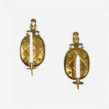 Candle wall sconces model 7011, pair by Paavo Tynell, c. 1935, brass, sold Aug 2026