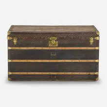 Goyard, Steamer trunk, c. 1920, vinylized canvas, brass, leather, wood, upholstery