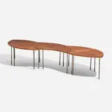 Pinwheel table, model 523 by Peter Hvidt & Orla Mølgaard-Nielsen, c. 1965, teak, brass-plated steel, sold Aug 2026