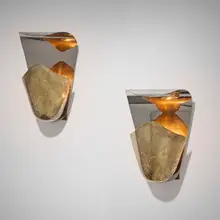 Harald Notini, Sconces model 8596, pair, c. 1945, perforated brass