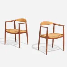 The Chairs, pair by Hans J. Wegner, teak, cane, sold Aug 2026