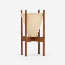 Planter, model S-02 by Lagardo Tackett, c. 1961, bisque ceramic, walnut, sold Nov 2022
