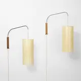 George Nelson, Bubble wall lamps, pair, 1952, sprayed fiberglass over metal frame, matte-chromed steel, walnut, enameled steel