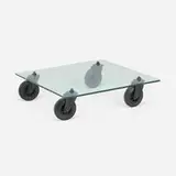 Gae Aulenti, Tavolo Con Ruote coffee table, 1980, glass, enameled steel, rubber
