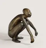 Hockender Neger by Gerhard Marcks, 1956, Bronze mit differenzierter goldbrauner Patina. Höhe: 27,7 cm (10 ⅞ in.), sold Jun 2012