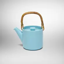 Stig Lindberg, Teapot from the Pastella series, 1953, glazed stoneware, rattan, metal