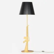 Philippe Starck, Gun floor lamp, 2005, gold leaf over aluminum and steel