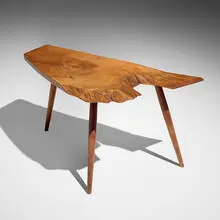 George Nakashima, Slab occasional table, 1960, English walnut, American black walnut, rosewood