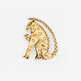 Joan Brown, Jaguar pin, 1986, 18k yellow gold vermeil sterling silver, emerald