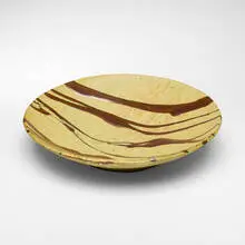 Warren Mackenzie, Charger, 2007, glazed stoneware with tenmoku drips