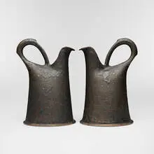 Pitchers, pair by Anne Hirondelle, c. 1995, soda-fired glazed stoneware, sold Aug 2026