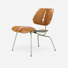 Charles and Ray Eames, LCM, slunk skin, aniline-dyed ash plywood, steel, rubber