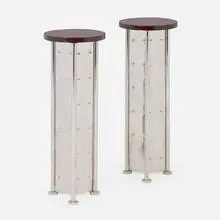 Philippe Starck, Occasional tables from the Royalton Hotel, pair, 1988, mahogany, stainless steel