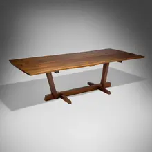 George Nakashima, Conoid dining table, 1982, American black walnut, rosewood