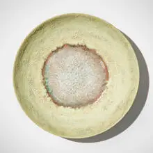 Charger by Beatrice Wood, c. 1960, glazed earthenware with pooled crackle glass, sold Aug 2026