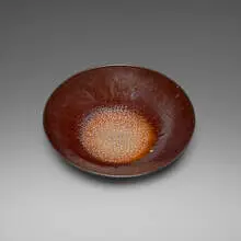 Tray by Gertrud and Otto Natzler, 1945, earthenware with Brown Yellow Grey Reduction Fired glaze, sold Aug 2026