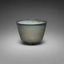 Bowl with straight sides by Gertrud and Otto Natzler, 1965, earthenware with Blue Gray Celadon RG Reduction Fired glaze with melt fissures, sold Aug 2026
