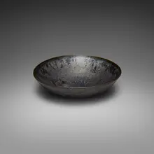 Bowl by Gertrud and Otto Natzler, earthenware with Gunmetal glaze, sold Aug 2026