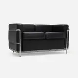 Settee by Charlotte Perriand, Pierre Jeanneret, and Le Corbusier, c. 1995, leather, chrome-plated steel, sold May 2026