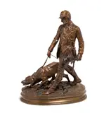 Pierre-Jules Mêne, French patinated bronze figural group of a huntsman and hound, patinated bronze