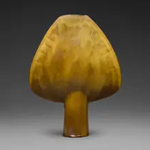 Trapezoidal open disk form by Otto Natzler, 1990, earthenware with Gold Crystalline glaze, sold Jun 2026