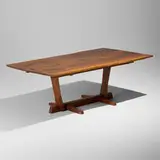 Conoid dining table by George Nakashima, 1974, American black walnut, rosewood, sold May 2026