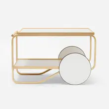 Tea trolley by Alvar Aalto, 1936 / 2018, laminate, birch, steam-bent birch plywood, rubber, sold May 2026