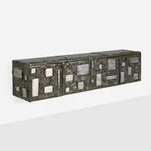Paul Evans, Sculpted Bronze wall-hanging cabinet, model PE 42, c. 1970, bronze resin over wood with brushed aluminum tile inserts, slate
