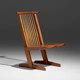 Conoid lounge chair by George Nakashima, 1986, American black walnut, hickory, sold May 2026