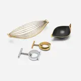 Carl Auböck, Collection of four tabletop accessories, brass, chrome-plated steel, patinated brass