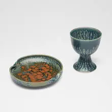 Brother Thomas Bezanson, Chalice and plate, blue elm ash with kaki-glazed porcelain, blue elm ash-glazed porcelain