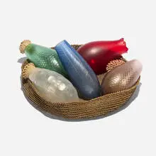 Seeds by Cristiano Bianchin, 1999, hand-blown glass, woven hemp, sold Apr 2026
