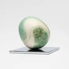 Harrison McIntosh, Egg Form, 1977, glazed stoneware, chrome-plated steel