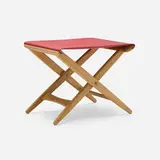 Folding stool by Uno and Osten Kristiansson, c. 1970, oak, leather, brass, sold May 2026