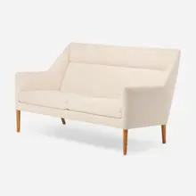 Sofa by Aksel Bender Madsen and Ejner Larsen, c. 1955, bouclé upholstery, oak, sold May 2026