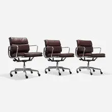 Soft Pad Management chairs, set of three by Charles and Ray Eames, 1969 / 2000, polished aluminum, leather upholstery, lacquered steel, sold May 2026
