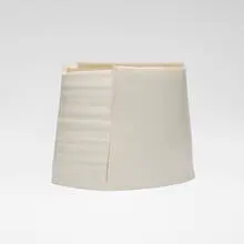 White Asymmetric Pot by Carina Ciscato, c. 2009, glazed porcelain, sold Apr 2026