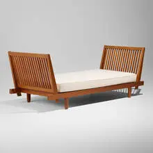Special-order bed frame by George Nakashima, 1961, cherry, upholstery, sold Apr 2026