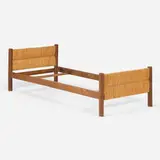 Bed for Méribel, France by Charlotte Perriand, c. 1956, rush, oak, steel, upholstered horsehair mattress, sold Apr 2026