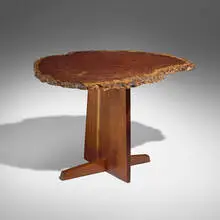 Minguren I end table by Mira Nakashima, 2001, American black walnut, burl, sold Apr 2026