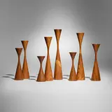 Rude Osolnik, Collection of eight candlesticks, c. 1991, kingwood, walnut